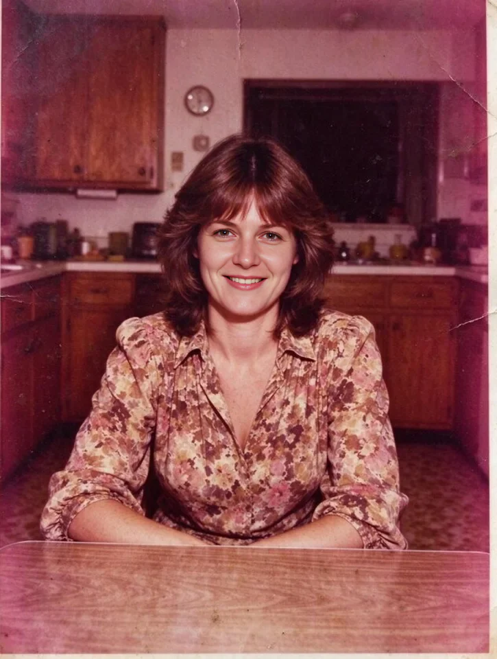 A 1980s kitchen portrait, face restored